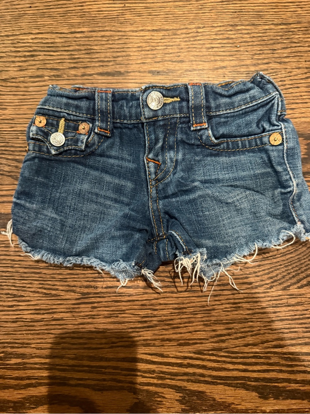 True Religion Blue Denim Distressed Shorts with Orange Stitching